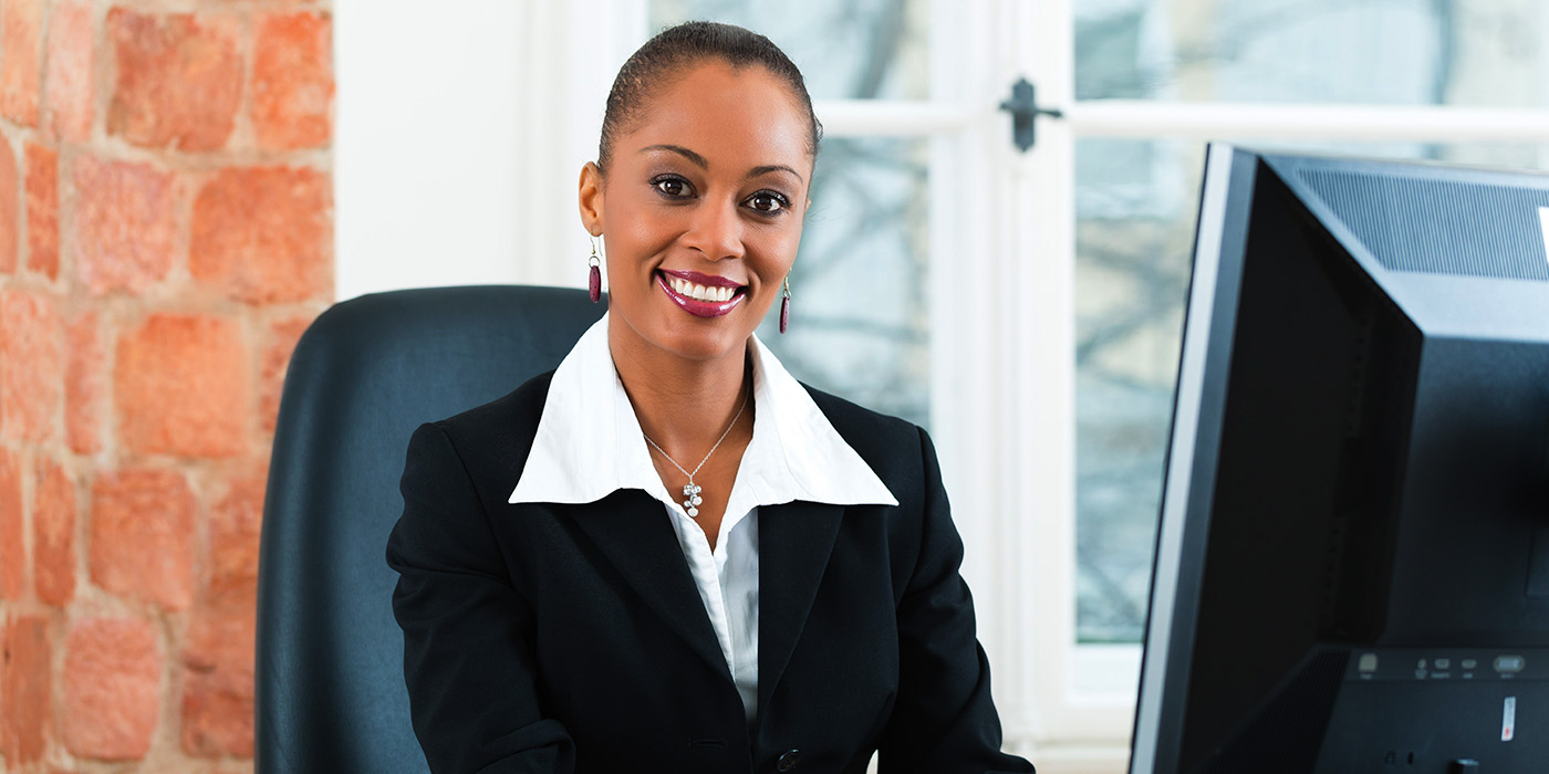 Professional Woman sitting in an office chair